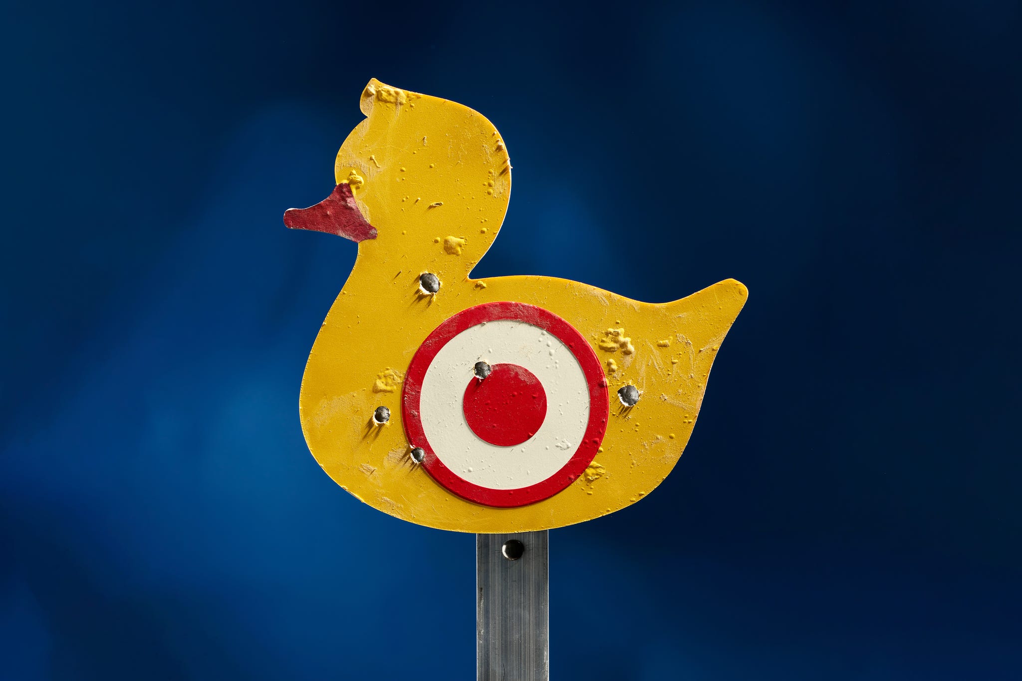 yellow duckshaped target with a bullseye design