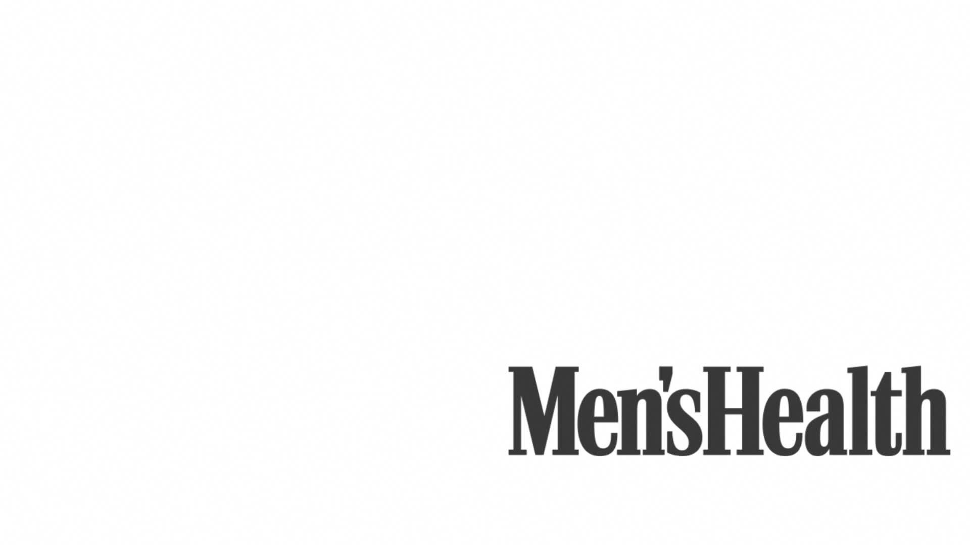 a portrait of fit mixed race man with dreadlocks doing exercise at home.