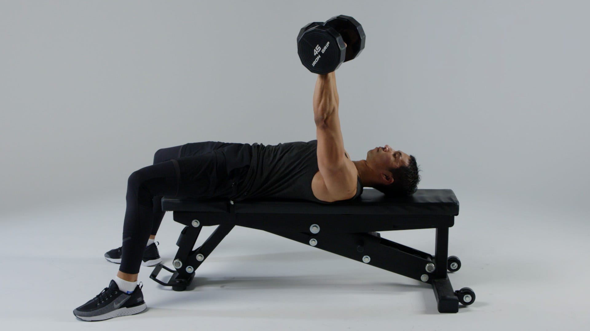 men fitness sport wearing sport shirt weight lifting dumbbell training in gym