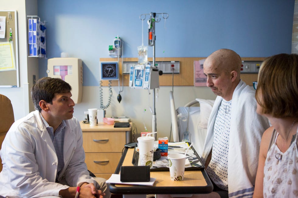 philadelphia, pa august 19, 2016 dr david fajgenbaum, left, visit his friend gary gravina, center, and his wife stacey gravina, right, at university of pennsylvania hospital in philadelphia, pennsylvania on august 19, 2016 mr gravina was hospitalized when he had a relapse of castleman's disease dr fajgenbaum also suffers from caslteman's jessica kourkounis for the new york times