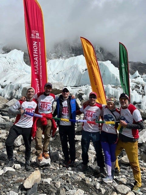 Group of runners at a mountain marathon event.