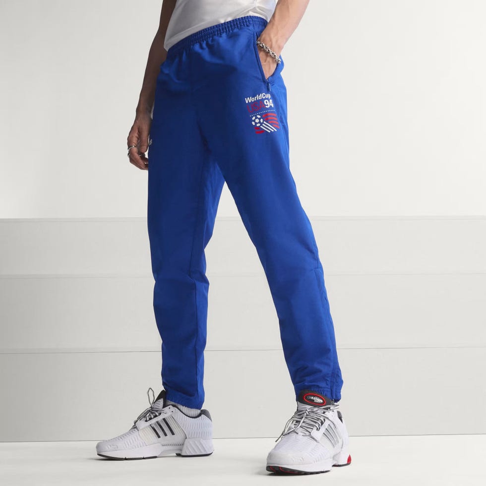<strong>USA ‘94 Graphic Woven Track Pants</strong>