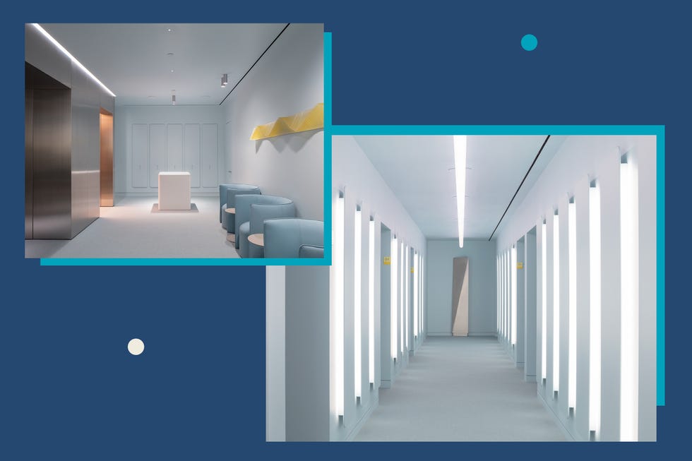 Modern interior showcasing a bright waiting area with blue chairs and a corridor illuminated by vertical lights.
