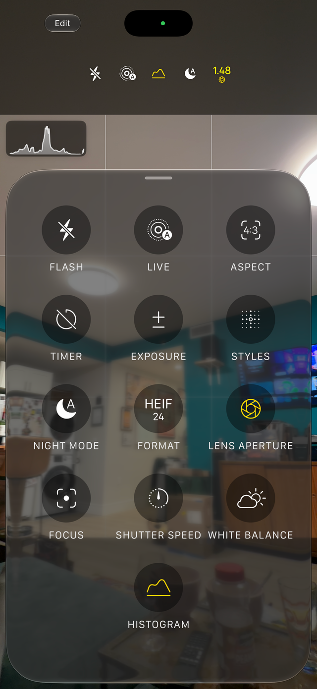 Camera interface displaying settings for flash, timer, exposure, and more on a smartphone screen.